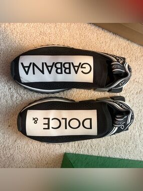 Dolce & Gabbana Black and White Logo Slip-On Sneakers — Bold Graphic Style